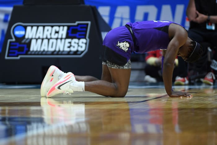 Mar 20, 2022; San Diego, CA, USA; TCU Horned Frogs forward Emanuel Miller (2) reacts after bloody nose in the overtime period against the Arizona Wildcats during the second round of the 2022 NCAA Tournament at Viejas Arena. Mandatory Credit: Orlando Ramirez-USA TODAY Sports